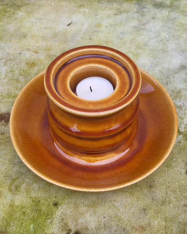 Cognac kleurige kaarsenstandaard