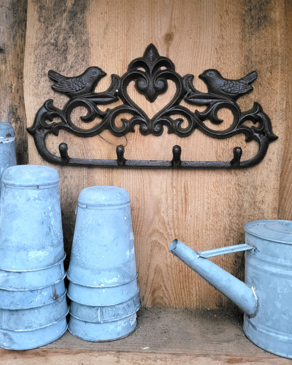 Gietijzeren ophanghaken met vogeltjes